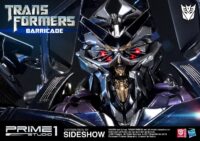 Descubre el apasionante mundo de Transformers Figura Barricade 76 cm.