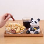 Descubre el apasionante mundo de Estatua Look Up Panda.