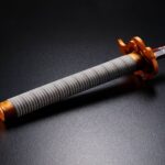 Descubre el apasionante mundo de Replica Espada Nichirin rota Kyojuro Rengoku.