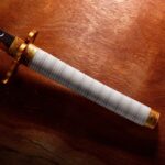 Descubre el apasionante mundo de Replica Espada Nichirin rota Kyojuro Rengoku.