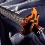 Descubre el apasionante mundo de Replica Espada Nichirin rota Kyojuro Rengoku.