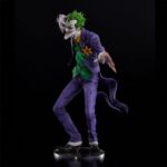 Descubre el apasionante mundo de Estatua The Joker Laughing Purple Version.