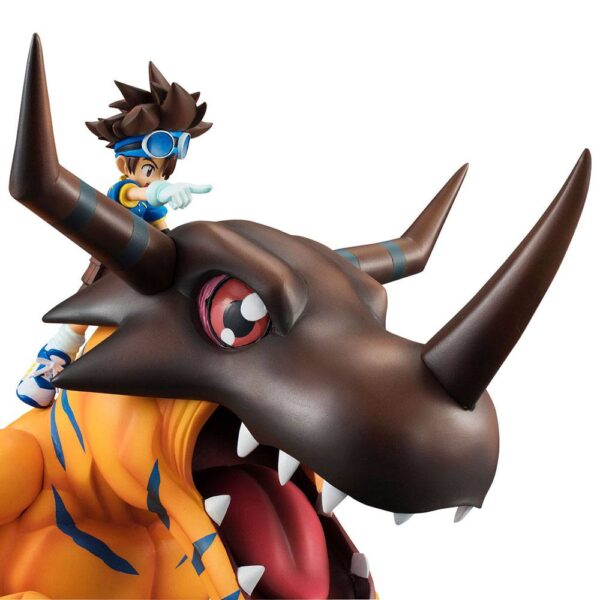 Descubre el apasionante mundo de Estatua Digimon Greymon y Taichi.