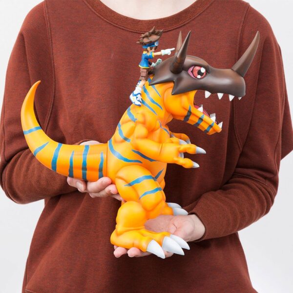 Descubre el apasionante mundo de Estatua Digimon Greymon y Taichi.