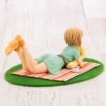 Descubre el apasionante mundo de Estatua Yumi Aiba off stage.