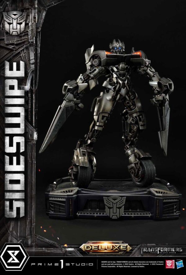 Descubre el apasionante mundo de Estatua Sideswipe Deluxe Bonus Version.