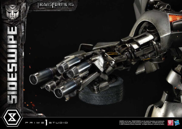 Descubre el apasionante mundo de Estatua Sideswipe Deluxe Bonus Version.