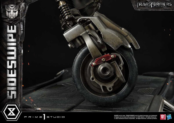 Descubre el apasionante mundo de Estatua Sideswipe Deluxe Bonus Version.