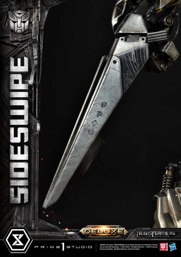 Descubre el apasionante mundo de Estatua Sideswipe Deluxe Bonus Version.