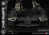 Descubre el apasionante mundo de Estatua Sideswipe Deluxe Bonus Version.