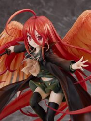 Descubre el apasionante mundo de Estatua Flame Haired Burning Eyed Hunter Shana.